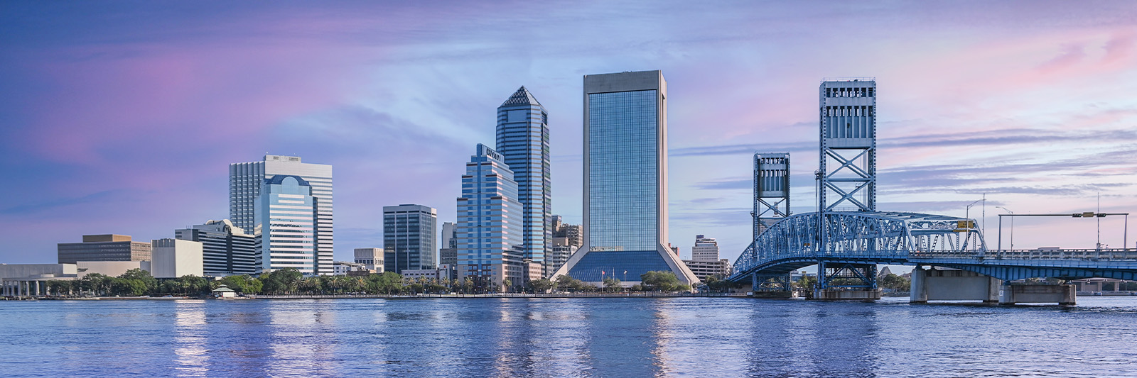Jacksonville Florida skyline with a purple and blue sky