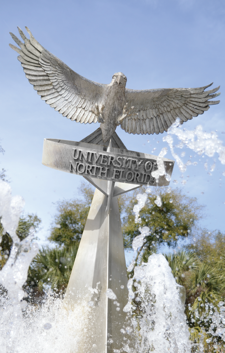 UNF Osprey Fountain with greenery in the background