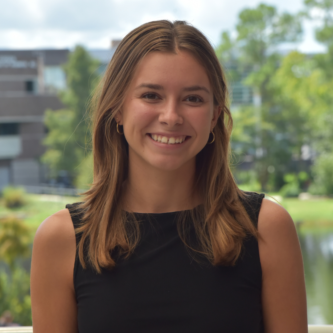 Kylie is standing outside