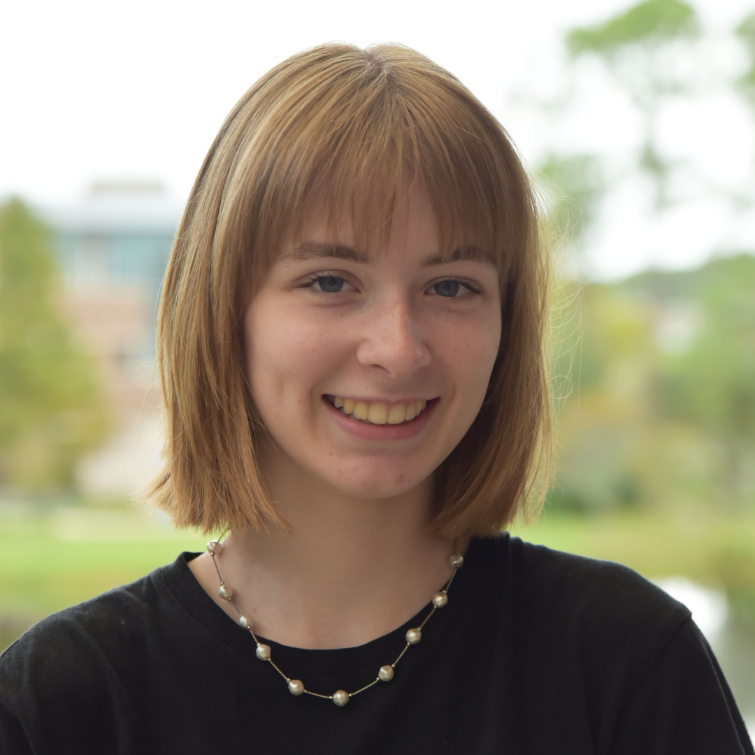 Mayaa is standing outside