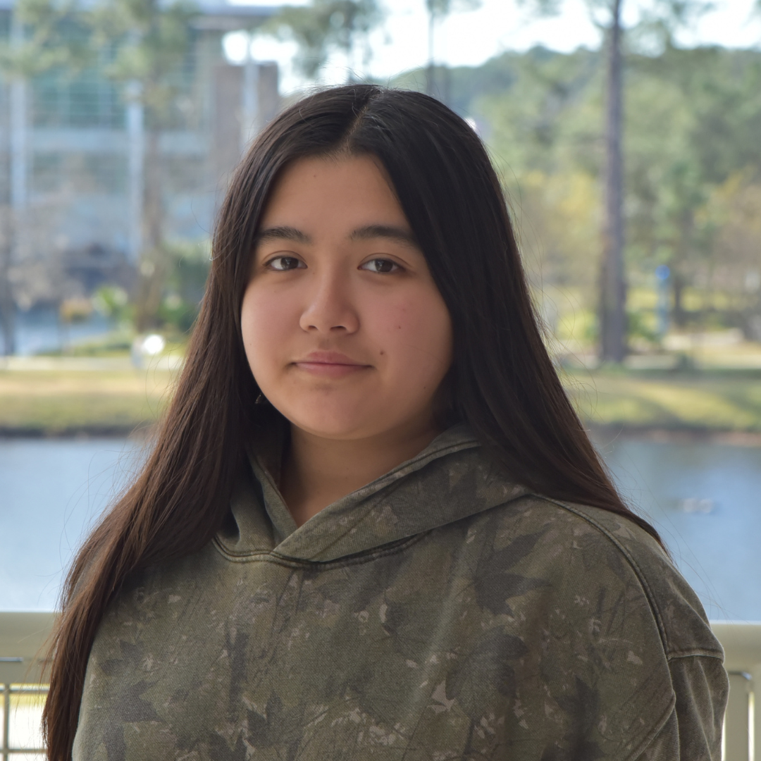 Trina has long dark hair