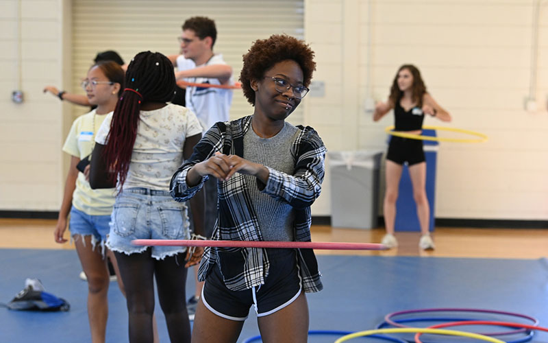 a student hoola hooping during flight school
