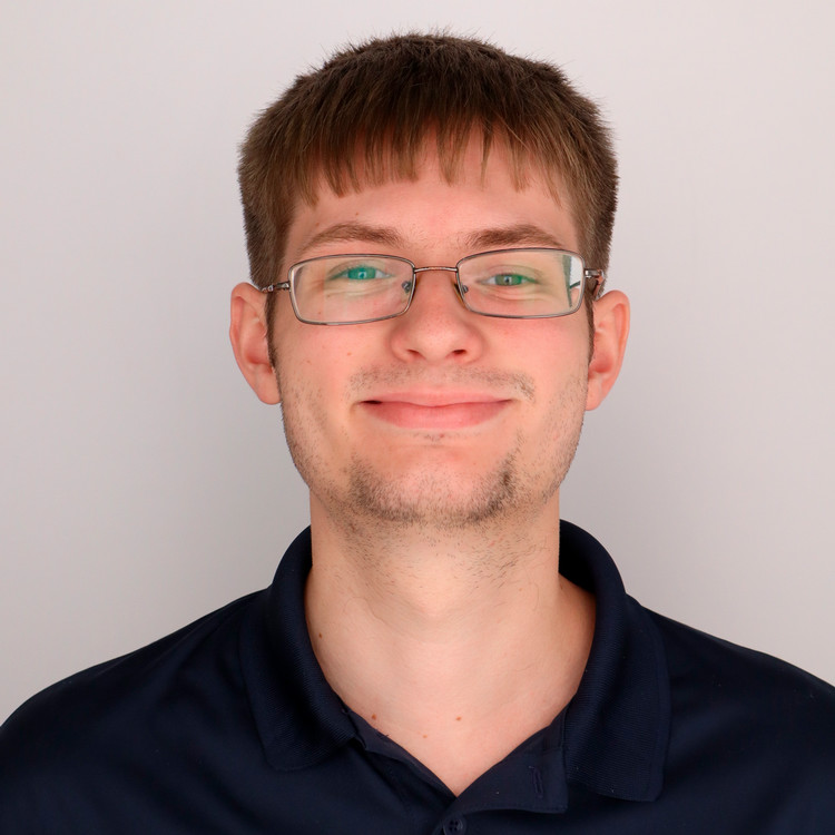 Benjamin Smith headshot taken in the SU Professional Portraits Booth