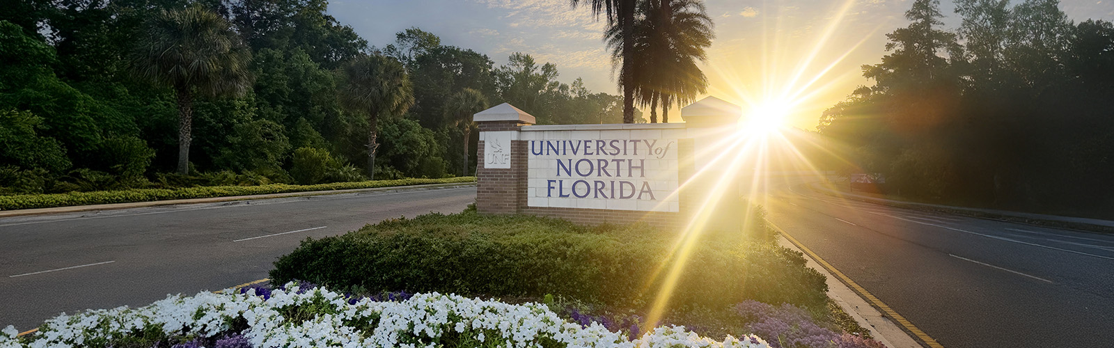 UNF entrance with sun ray in the background