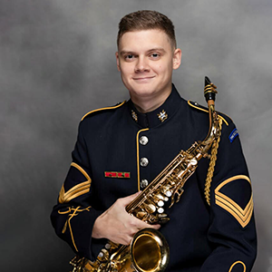 Headshot of Daniel Dickinson in Army Uniform with saxophone