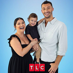 Photo of Loren Brovarnik with husband and son