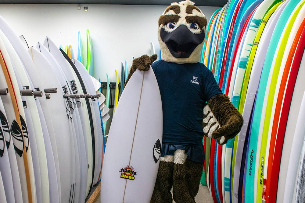 Ozzie with a surfboard