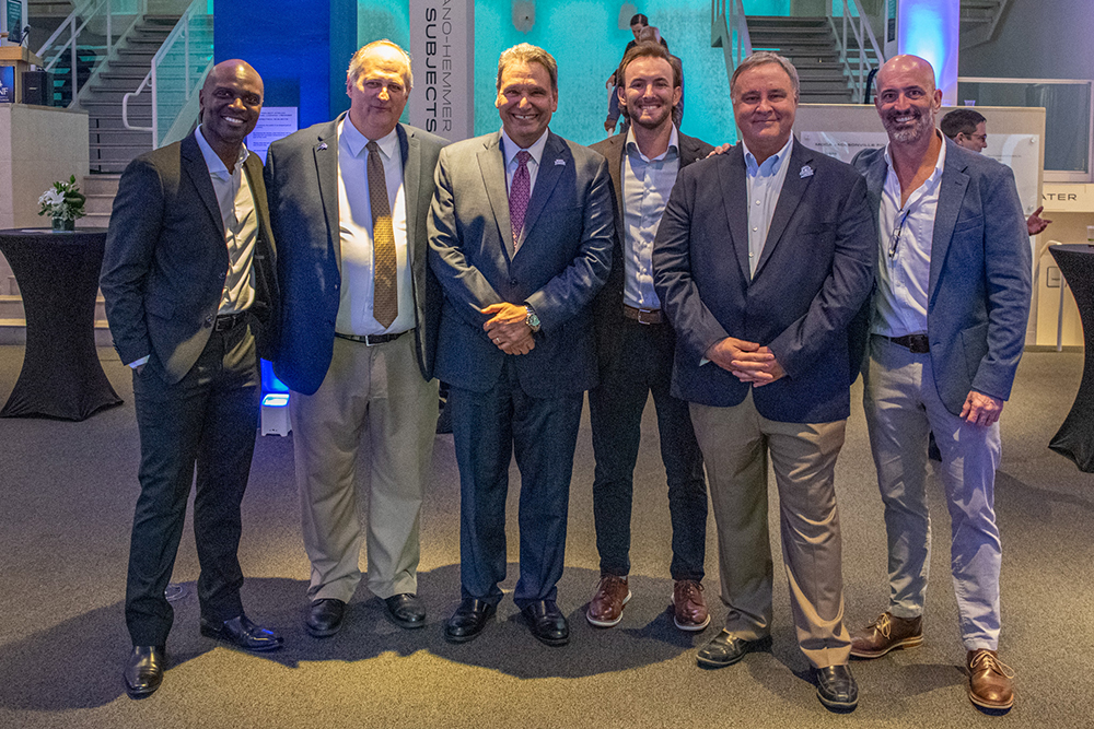 Members of the UNF Alumni Board with President Limayem