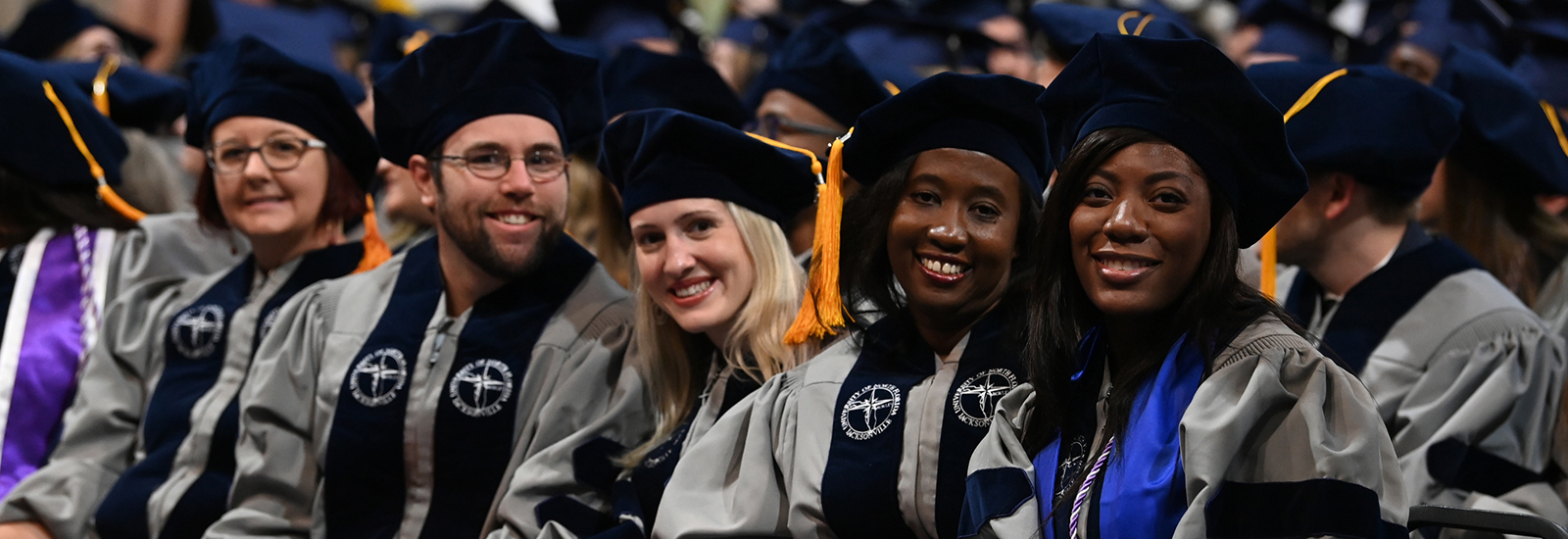 UNF graduates posing for a photo