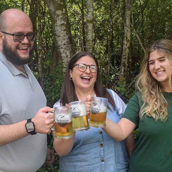 Ospreys holding Flocktoberfest beer steins