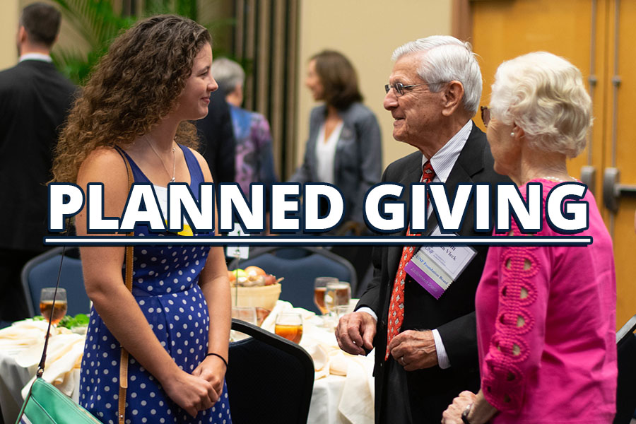 Older donors talking to student