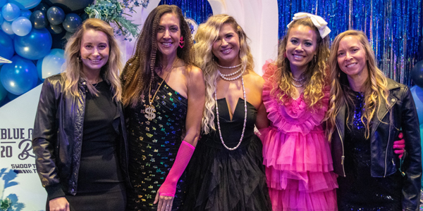 Women Dressed in 80s Attire