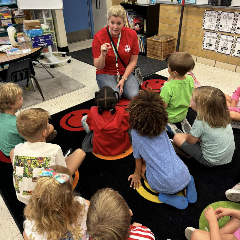 Principal Kimball speaking to children