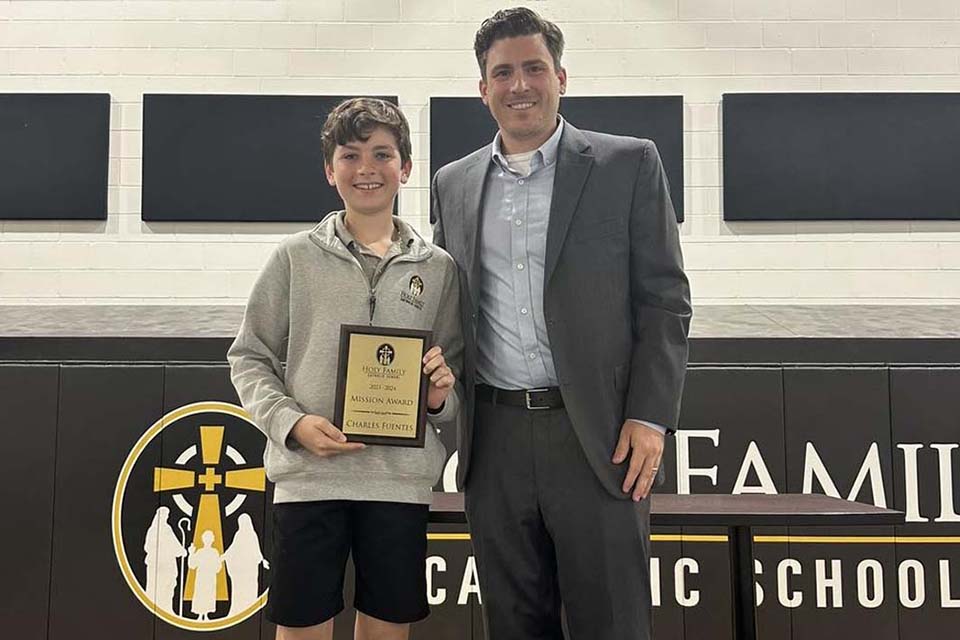 Holy Family principal and student