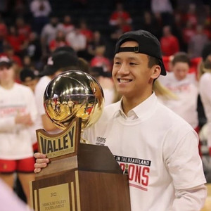 benji holding up trophy