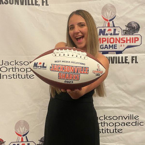 catherine cavallo holding football