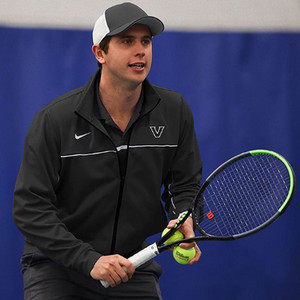 jack playing tennis