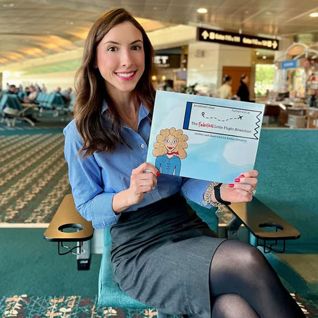 Jordan holding her book