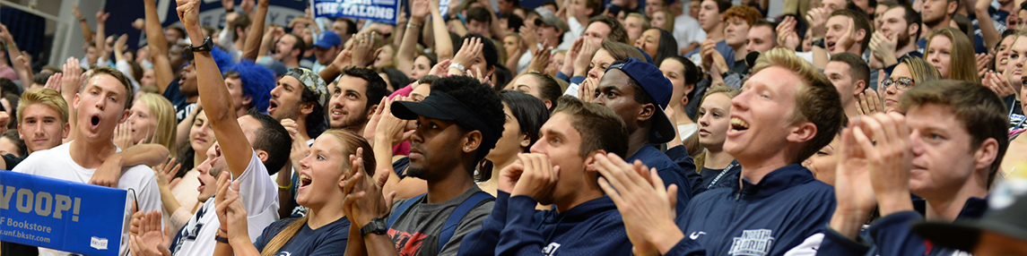 Crowd of students clapping and cheering at a UNF Arena event