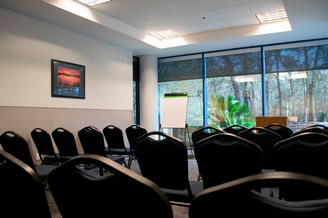 Empty lecture room with white board and podium