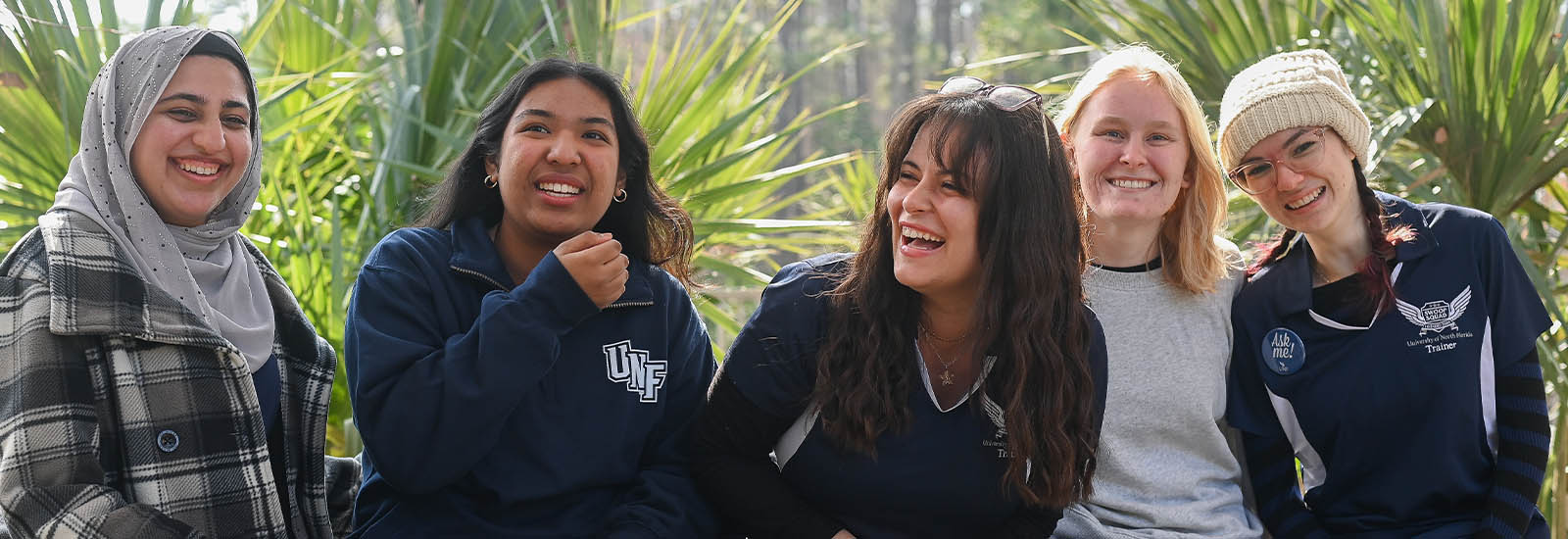 A picture of five members of UNF's Swoop Squad